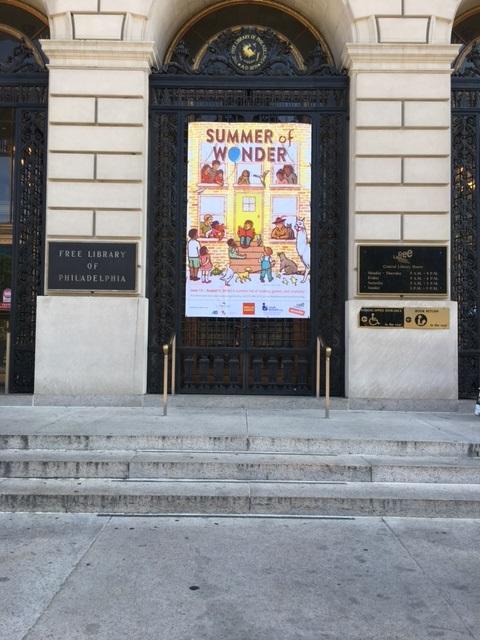 2016 Summer Reading - Summer of Wonder banner, hanging outside of Parkway Central Library. Artwork by Lauren Castillo.