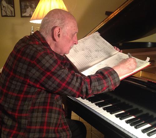 George Crumb working at his piano, 2013. Photo credit: Margaret Leng Tan