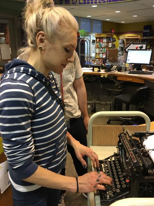 South Philly poet Maria Fama composing first of Fumo Family Library Community Poem