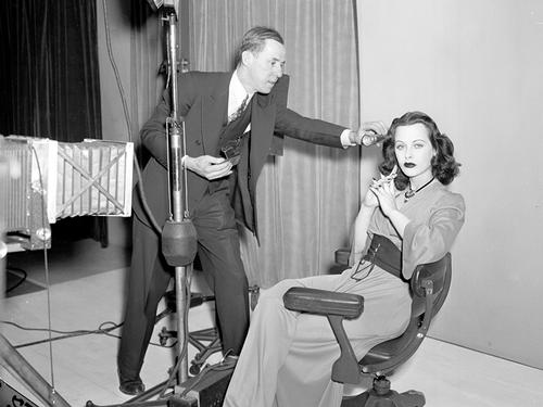 Hedy Lamarr on set, getting ready to film.