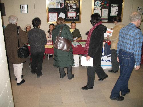Attendees Browse the Information Booths