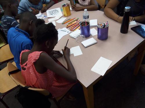 Group of kids participating in Mighty Writers workshop at Great Olney Library