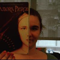 Example of 'BookFace Friday' taken by a student at Science Leadership Academy.