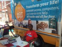 Ken Manns, Director, Volunteer Services Program, with the Techmobile outside South Philadelphia Library's grand opening block party.