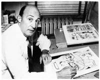 Will Eisner at his drawing desk