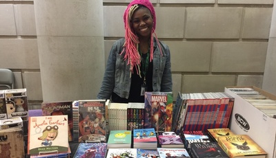 Ariell Johnson, owner of Amalgam Comics, is just one of the many entrepreneurs you can support by shopping at Black-owned businesses in Philadelphia!
