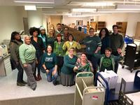 Materials Management staff in their Eagles green.