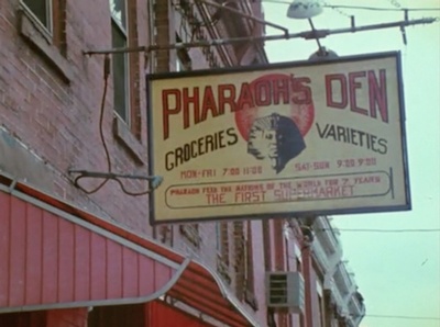 The sign outside the Pharaoh's Den, the grocery store that Arkestra members operated in Germantown in the1970s. 